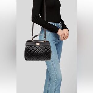Badgley Mischka Elegant Black Quilted Handbag. Gorgeously crafted.